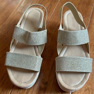 Gently worn. Super comfy platform sandals. Gold shimmer stretch bands
